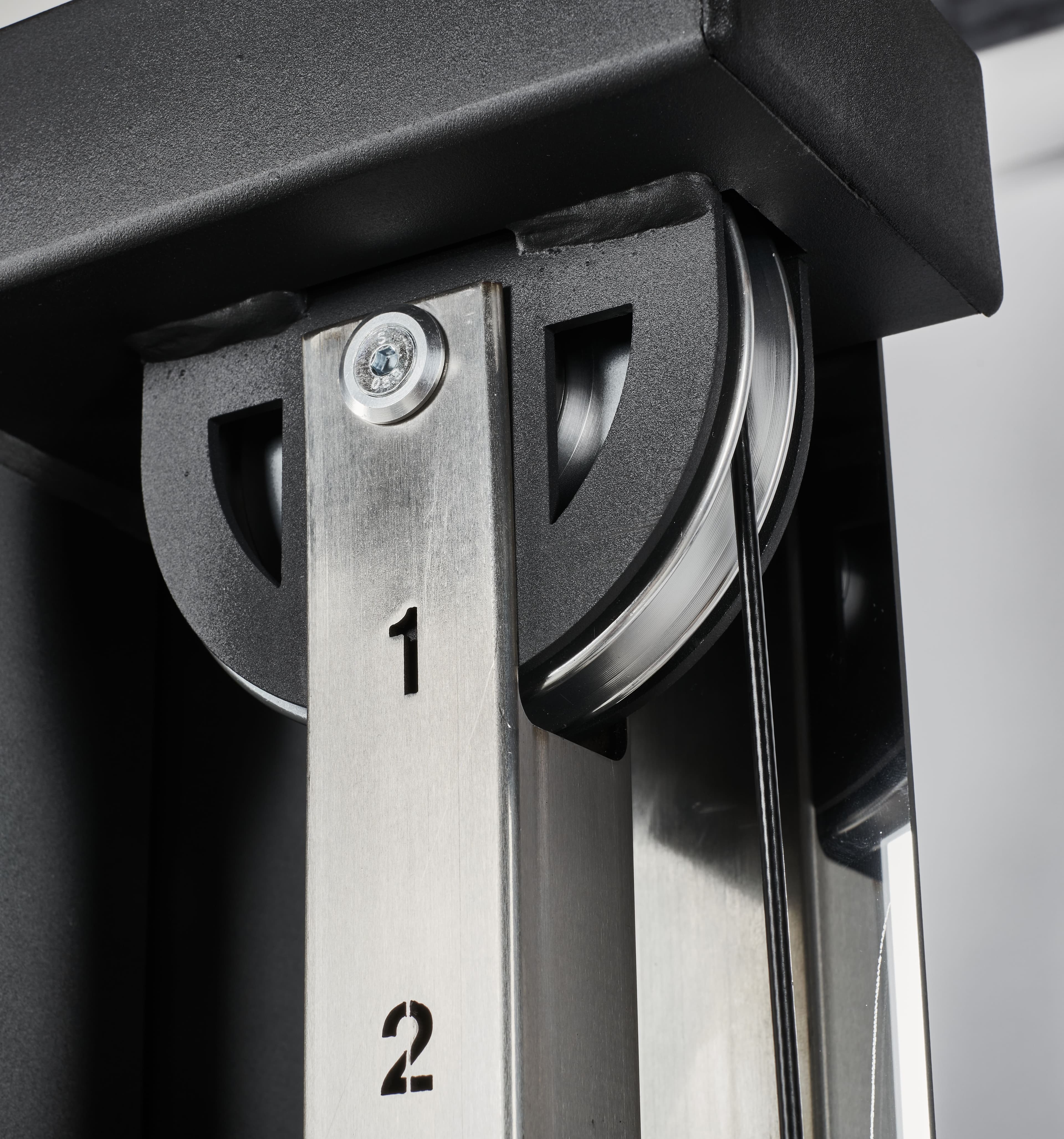 ATX Duo wall-mounted pulley station with 2 x 60 kg weight plates